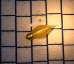 New Spun Satin Gold Amber E27 Light Bulb 40W Flame C15 Glowescent SUB4 03017. Fixed Price $11.98.